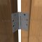 Ives 3SP1, Spring, Concealed Bearing, Full Mortised Hinge on a Wooden Door