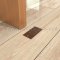 Ives Dust Proof Door Strike Installed on the Floor - US10 Finish