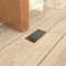 Ives Dust Proof Door Strike Installed on the Floor - US15 Finish